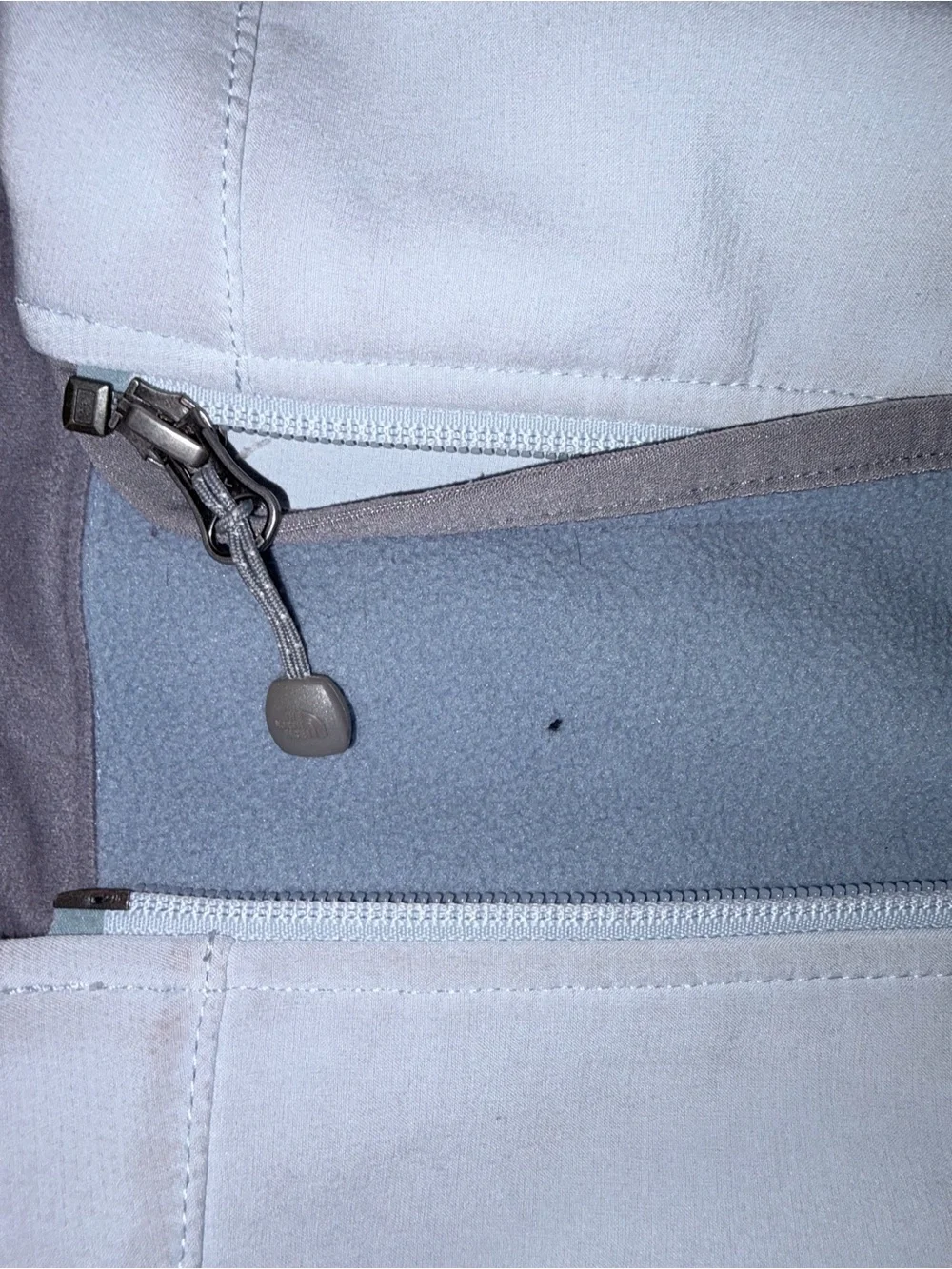 The North Face Women's White Softshell Jacket with Light Gray Fleece Lining